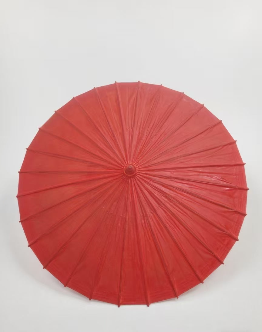 Festive red oil-perper umbrella